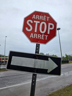 A final bilingual stop sign before leaving Canada.