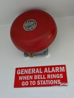 A Hose-McCann bell, used as the general alarm.