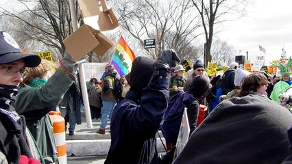 Getting off of the sidewalk and into the street, we are underway to get positioned to join the mainstream march.