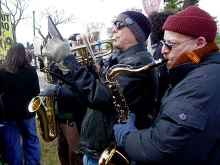 A few people in the anti-war crowd played musical instruments.