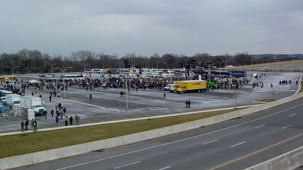 All the while, the mainstream march group was continuing to arrive at the Pentagon's north parking lot.