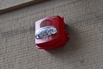 Weatherproof version of the Simplex TrueAlert horn/strobe on the exterior of the Ace Hotel.