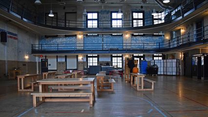 The old gym, with vintage paintwork, still in active use as an event space.