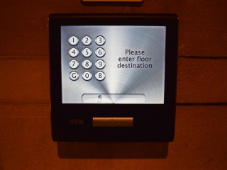 Touchscreen, where riders enter their destination floor, seen here on the main floor. Some floors used keypads instead of touchscreens, but the function is the same.