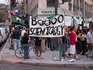 For this raid, we had two banners. One, at the head of the triangle, read, "BOOOO SCIENTOLOGY", while the other, in the Connecticut Avenue median, read, "Scientology destroys lives."