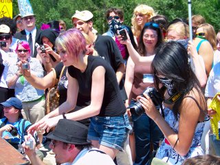 Photographing the cake eaters and lending encouragement.