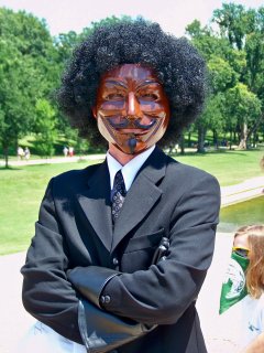 One person painted their Guy Fawkes mask brown, and wore an afro wig.