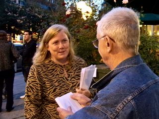 Meanwhile, Scientology spokesmodel Sylvia Stanard was handing out press releases in an attempt to intimidate Anonymous. Here, she is handing a press release to Boris Korczak. Here is the full text of the press release.