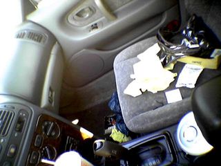 On June 2, when I borrowed Sis's car while mine was getting serviced, I found it amusing that she complains that my car is messy.  Look at this - this is more of a mess than my car ever is!