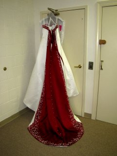 The wedding dress is out, and ready to go.