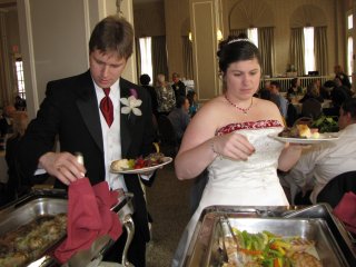 The newlyweds hit the buffet.