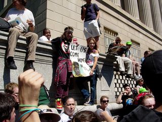 Along a wall, a crowd had gathered to watch.