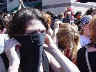 And as it became closer to the time to march, Maddy, Olga, and I all masked up.