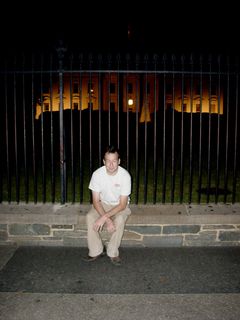 First, Ataan posed alone in front of the White House.