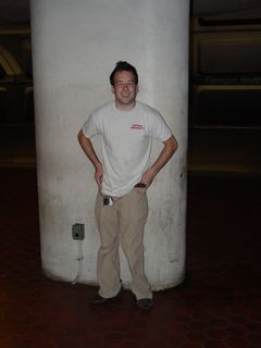 Ataan poses next to a column at Farragut North station.