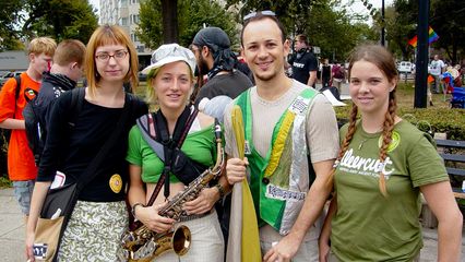 Other Rude Mechanical Orchestra members pose for a photo.