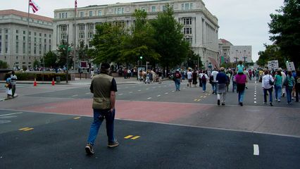 Passing the west side of Freedom Plaza, preparing to make a turn onto Pennsylvania Avenue.