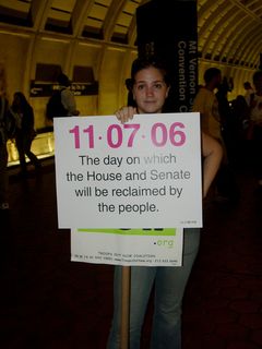 At Mt. Vernon Square station, this woman was holding two signs while waiting for the train. One about getting the troops out of Iraq, and another reminding us all about the 2006 midterm elections.