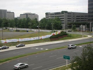 View of Tysons Corner from our train. My car was parked in that fenced area to the left.