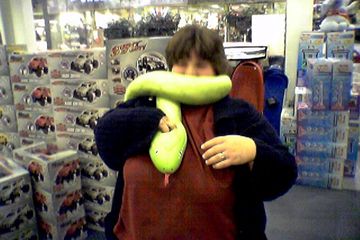 Photos taken inside the KB Toys store while it was still in operation, on December 1, 2004.  On this occasion, Katie Shapiro (remember her?) and I posed with some plush snakes.