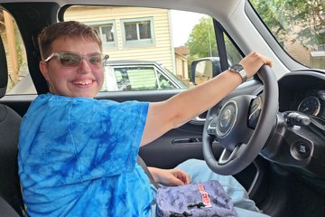 Elyse posed for a photo in the driver's seat of the Renegade while we were at Fred's house.