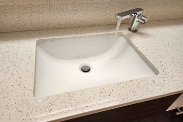This was the sink in our hotel room.  I wasn't a fan of this design.  It looks nice, but I felt like the faucet was too close to the edge of the sink, and the shape of the basin, combined with the location of the faucet near the edge of the basin, made it difficult to fill up my water bottle.