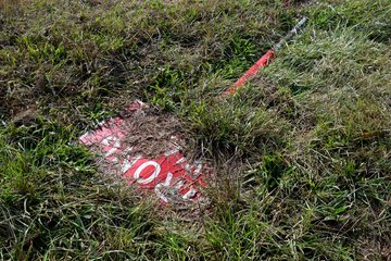 Once we got out of the hotel and on the road, we stopped on the roadside just before we got on I-40 in order to photograph some of the I-40 shields.  This "WRONG WAY" sign was on the ground near the I-40 signs.  Considering the way it was laying, I wondered if someone hit it while going the wrong way.