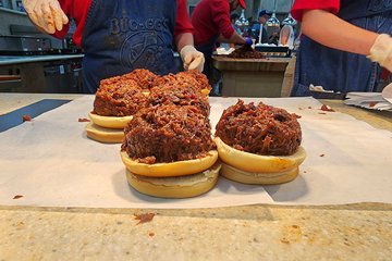 Watching Buc-ee's sandwiches get made.