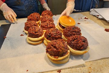 Watching Buc-ee's sandwiches get made.