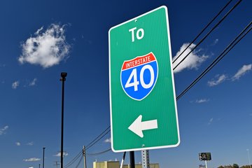 One of several signs posted on the property indicating how to get back to I-40.