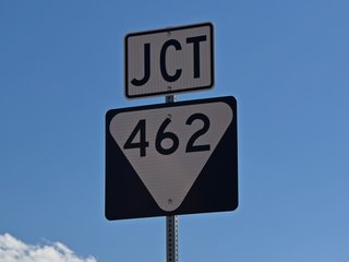 Shield for State Route 462 next to Buc-ee's.  Like Virginia, Tennessee designates primary and secondary state routes, with primary routes' having a square shield with an outline of the state in the bottom, while secondary routes use this triangular design.