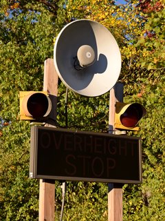 Parabolic dish bell, serving as a warning for overheight vehicles in order to prevent them from hitting the bridges that carry I-40 across TN 95 and US 321.