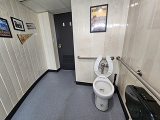 The restroom at the Sunsphere.  I don't know quite what I was expecting, but here it is, with paneling and Knoxville posters on the wall.  Seems fitting, I suppose.