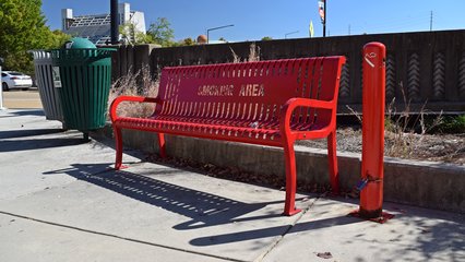 I found the way that they designated the smoking areas at the transit center to be relatively interesting.  Rather than just signage, they painted the benches bright red, and have "SMOKING AREA" designed directly into the bench itself.