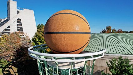 The giant basketball on the Women's Basketball Hall of Fame, designed to look like a basketball going into a net.