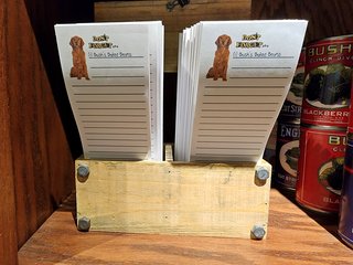 Souvenir notepad with Duke the Bush's beans dog, titled "Don't forget..." with Bush's baked beans printed as the first item.