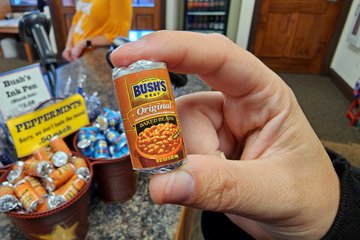 Elyse holds up a package of Bush's brand mints.  They are just regular peppermints with novelty packaging.  There's even a note that reads, "Sorry, we don't taste like beans!" with them.