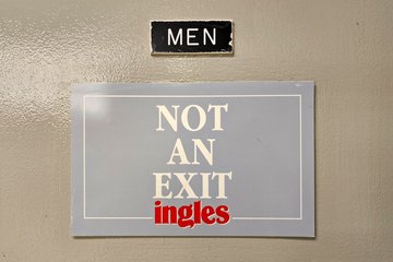 And in case anyone was wondering, the men's room is not an exit.  I imagine that there is probably a reason that this sign is here.