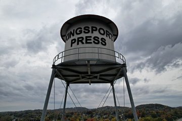 I went up with the drone and photographed the Kingsport Press water tower (which is just there for looks, and isn't a real water tower) in order to show Jackson how the drone worked.  He was impressed.  The gray sky, however, made the photos look less than satisfactory.