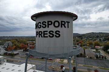 I went up with the drone and photographed the Kingsport Press water tower (which is just there for looks, and isn't a real water tower) in order to show Jackson how the drone worked.  He was impressed.  The gray sky, however, made the photos look less than satisfactory.