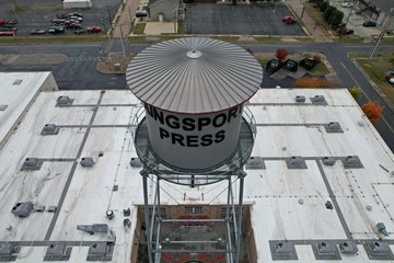 I went up with the drone and photographed the Kingsport Press water tower (which is just there for looks, and isn't a real water tower) in order to show Jackson how the drone worked.  He was impressed.  The gray sky, however, made the photos look less than satisfactory.