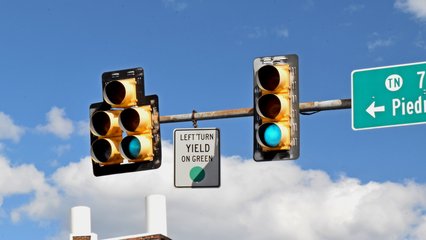 Traffic lights over State Street in Bristol.