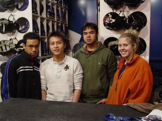 At the ice skating rink at Pentagon Row, the employees took a moment to pose for a photo.