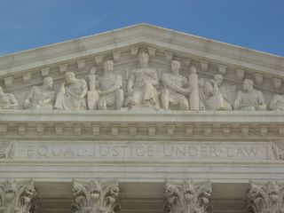 On my February 1 DC trip (also the final DC trip to use the Previa), the pediment on the Supreme Court building was covered in netting after a chunk of marble fell from the building onto the steps below a few days earlier.