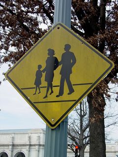 Near Union Station, this sign puts a new twist on the traditional "PED XING" sign, showing a family crossing the street.