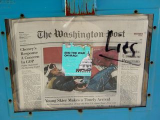 This Washington Post box has a sticker about the September 24 protest on its face, as well as "Lies" written in marker nearby.