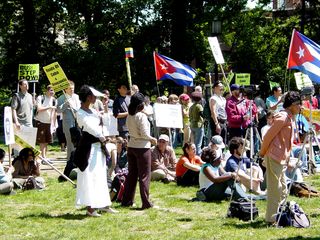 On May 20, I was in DC, and photographed a protest called "Hands Off Venezuela and Cuba" sponsored by ANSWER. They met at Malcolm X Park, and marched to the White House - the same basic concept as J20's march route. However, unlike J20, which was a direct march down 16th Street, ANSWER's march was far more circuitous. I didn't march with them. I left before they took off, and caught up with them later.