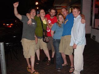 On July 2, a Sunday night, I photographed in the Corner District of Charlottesville. It was fairly quiet, but there were still some UVA students out and about. This group posed for a photo. Based on how many of them were acting, I'd guess that they'd had a few drinks while they were out.