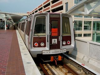 After checking out Code Pink, I went railfanning, which was the main reason for taking the trip on July 4, since Metro runs a special service pattern on that day. Note that this Rohr at Largo Town Center is signed as an Orange Line train. Also note the weather. Perfect, clear skies.