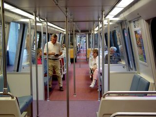 What is wrong with this September 20 picture of Breda 3085 at Vienna? Answer is, the bulkhead doors were open all the way through to the fourth car of this six-car train. I notified the operator when he entered, and he got on the PA: "Hey, Bruce, when you walk past the train, make sure all the bulkhead doors are closed. Some may be open." Bruce closed them, and operator announced, "Thanks, Bruce." The operator thanked me when I departed at Rosslyn. Additionally, Breda 3085 was one of the cars that Metro missed when they converted all the cars to the new chimes, so I got to hear Sandy Carroll do her "doors closing" voice.